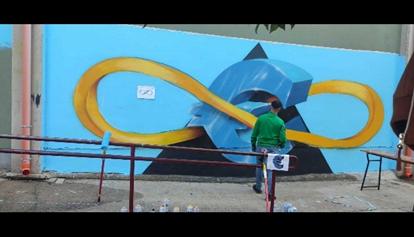 Gli studenti disegnano il muro della scuola di Maracalagonis