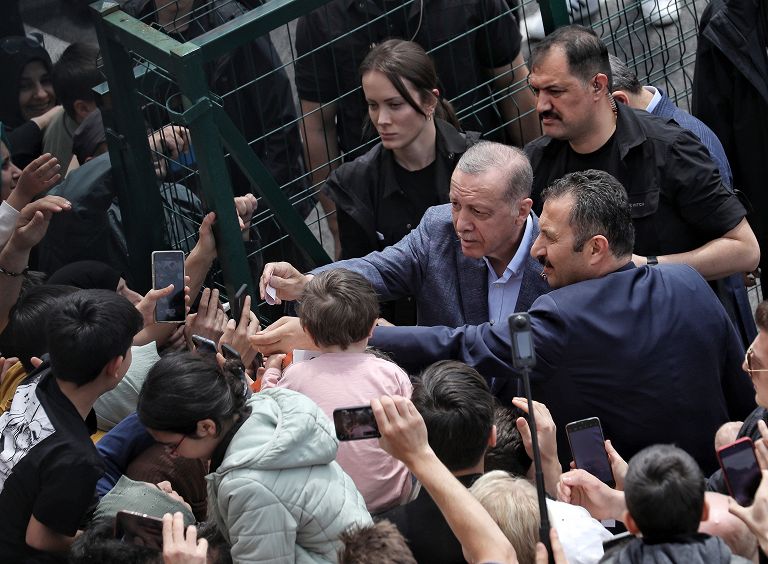 Tayyip Erdogan arrives at the polling station