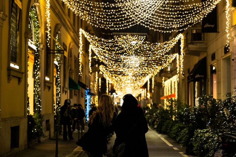 Via Gesù near Via Monte Napoleone is decorated with Christmas lights in Milan